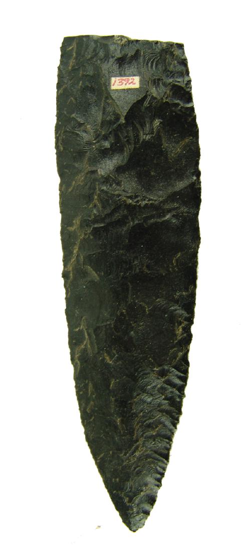 Oregon Obsidian Spear Point: Large expertly knapped black obsidian glass spear point found near Merrill. Very good condition, but missing heed.7-1/4"Pre Historic