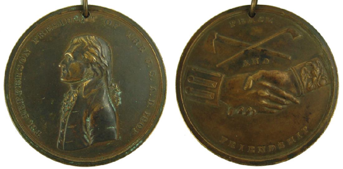 Antique Peace Medal: Beautiful solid copper Thomas Jefferson peace medal dated "A.D. 1801" this exquisite example drilled and with a copper or brass ring. Very good condition. Ex. Day Collection/Knots Berry Farm.3"Early 1
