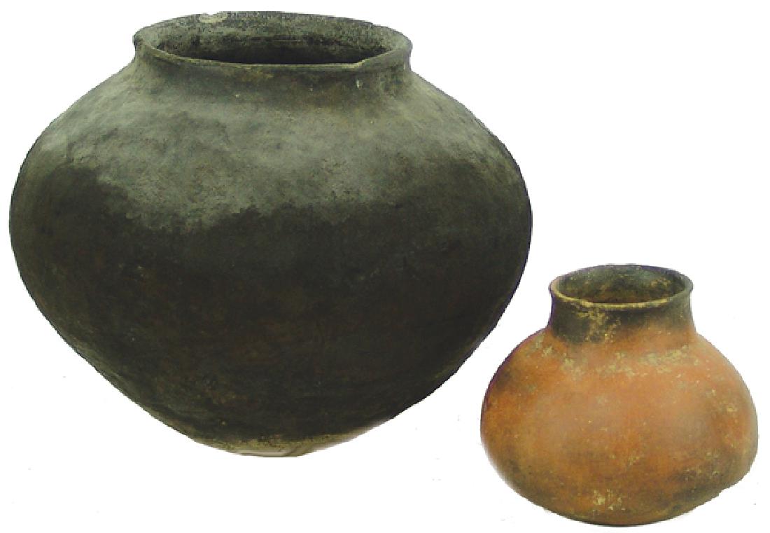 2 Salado Pottery Jars: Includes a fine, small, red onion skin olla, plus a large blackware cooking pot that shows much use. Very good condition. Both intact with no damage or repairs.5-1/2" x 6" - 11" x 12"Pre Historic