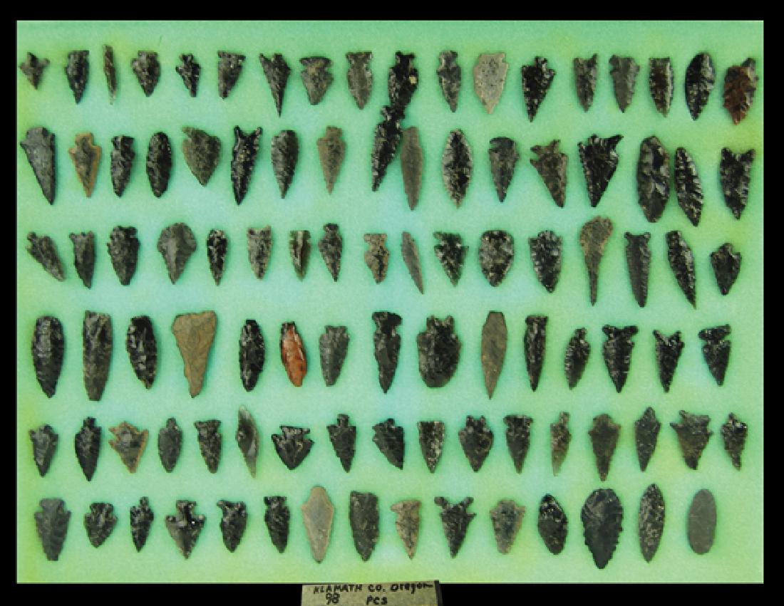 Oregon Obsidian Arrowheads: Impressive collection of 98 whole and fragmentary points labeled "98 pcs Klamath collection Oregon." Various conditions, in a 17" x 12" ryker.Largest 1-3/4"Pre Historic