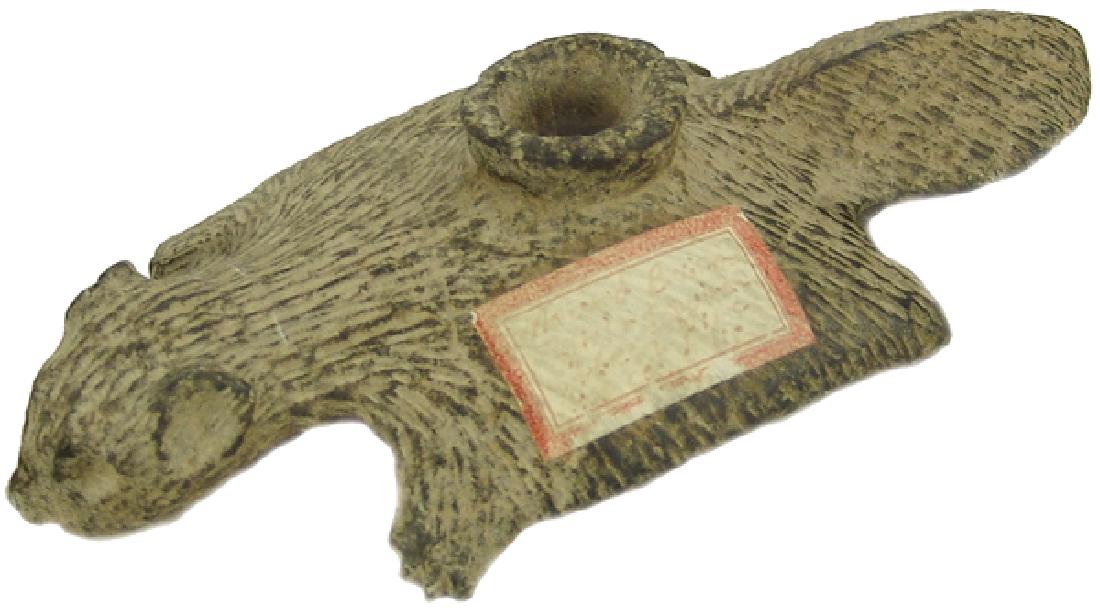 Carved Stonepipe: Wonderful hand carved solid stone pipe depicting a flying squirrel. Very good condition. Marked "Mound Builder" and from the Evans collection.7" x 3"Antique