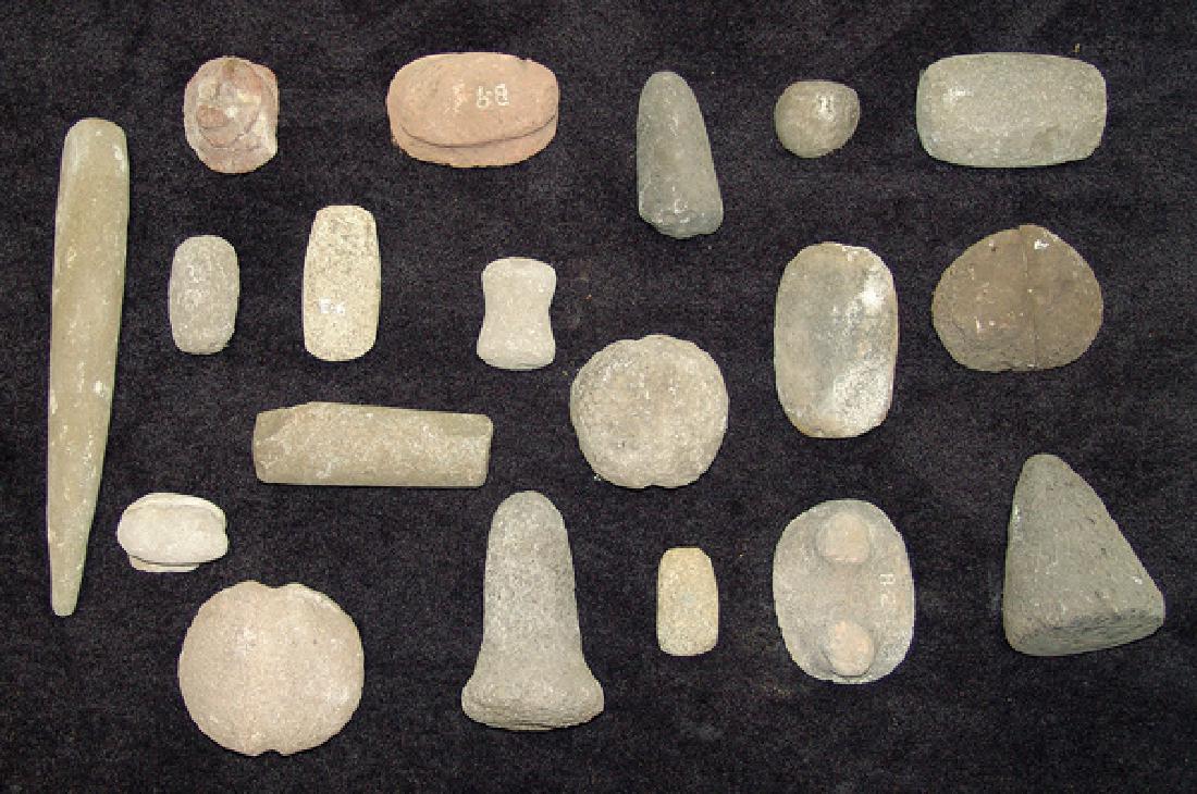 Oregon Stone Artifacts: Group of 18 excavated stone relics found near Klamath Falls, one pre 1950s includes small axe heads and club heads, pounders, pestles, two horn muller, anchor weights, etc. Various conditions.Largest 