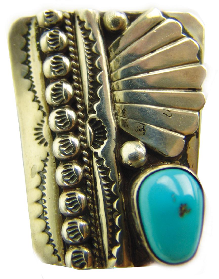 Navajo Bolo Slide - O and J Clark: Fine, all silver bolo ties/slides with dot and leaf expressions, plus a single light blue turquoise stone. Very good condition.1-1/2" x 1-1/4"Late 1900s