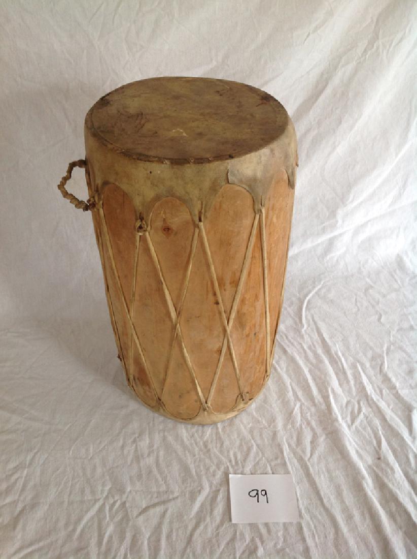 Cochiti Log Drum: Handcrafted hollow wood log drum with traditional rawhide faces. Very good condition.23" x 12"Late 1900s