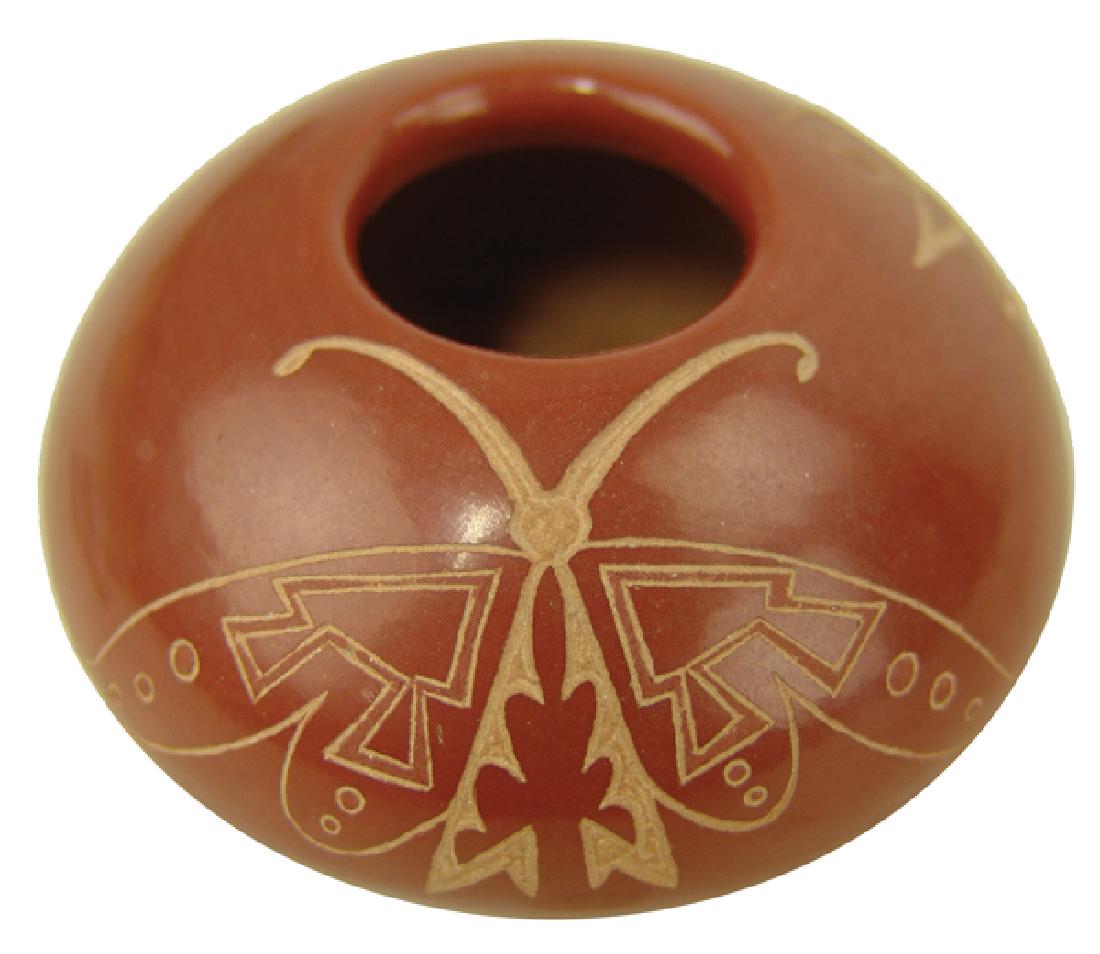 Santa Clara Pottery Jar - Golden Rod: Very fine, miniature, sgraffitto redware seed pot with detailed butterfly and floral figures. Very good condition. Golden Rod a.k.a. Gloria Garcia (b. 1942.)2" x 3"Late 1900s