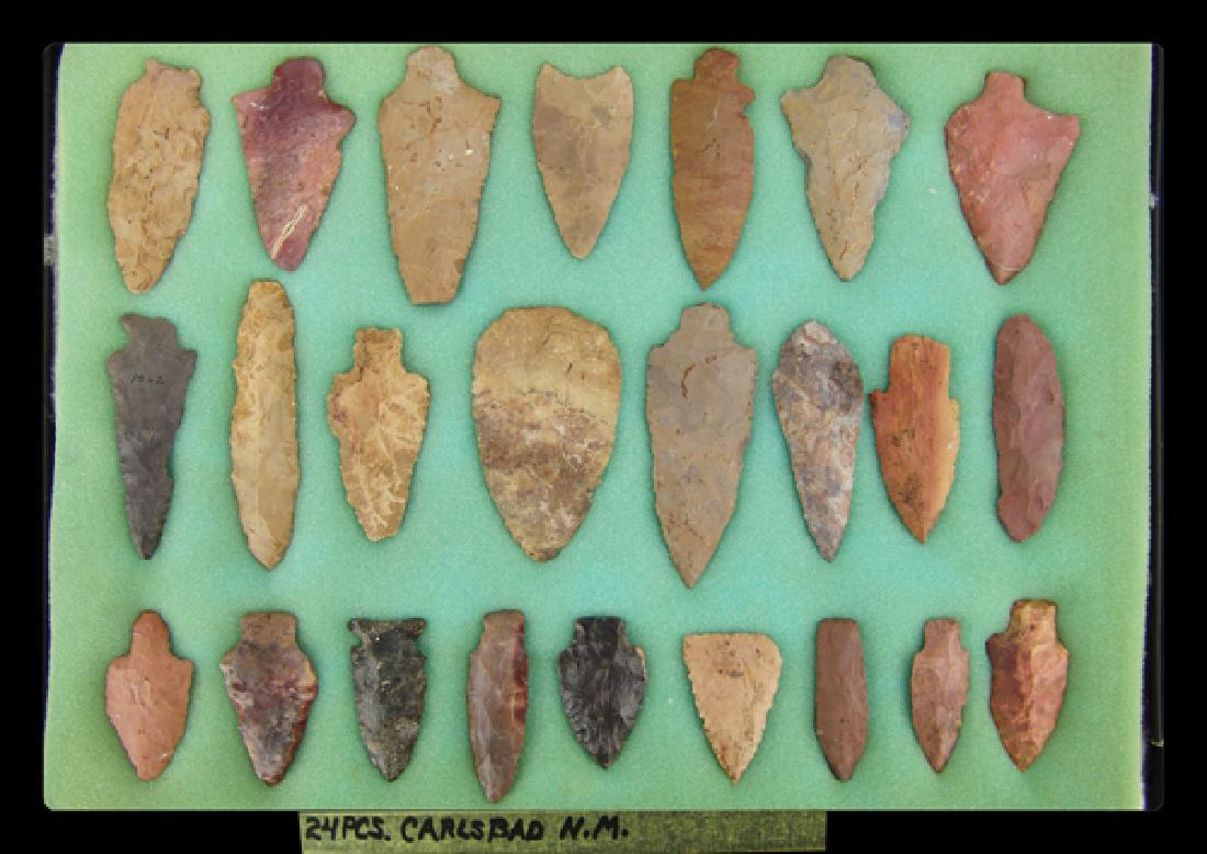 New Mexico Points and Blades: Collection of 24 larger excavated spear points, arrowheads, and tools marked "24 pcs. Carlsbad, NM." Good to very good condition. In 17" x 12" Ryker mount.Largest 4"Pre Historic