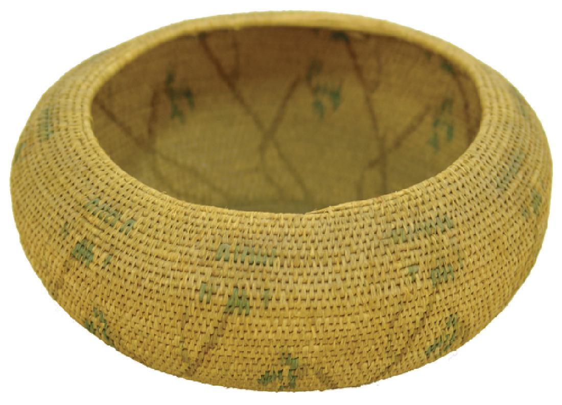 Indian School Basket: Early, fine weave, coiled basketry bowl done during the early 1900s arts and crafts movement in southern California, possibly from the George Wharton James School. Good condition, minor stitch loss.6"