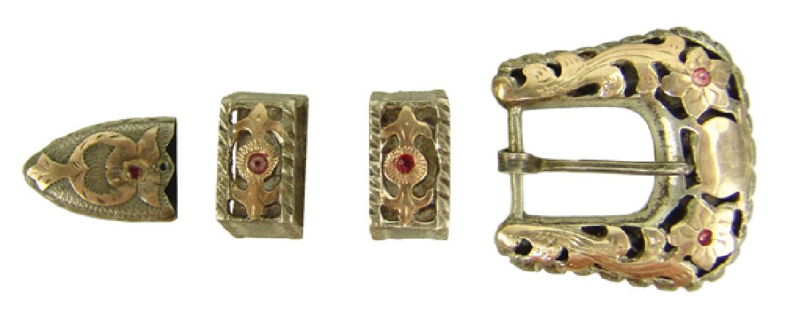 Silver and Gold Ranger Buckle: Vintage, handwrought, hour piece .925 silver and rose gold 1" buckle set with ruby and gemstone sets includes buckle, two keepers, and tip. Very good used condition. Marked "Silver-Made in Mexico."For