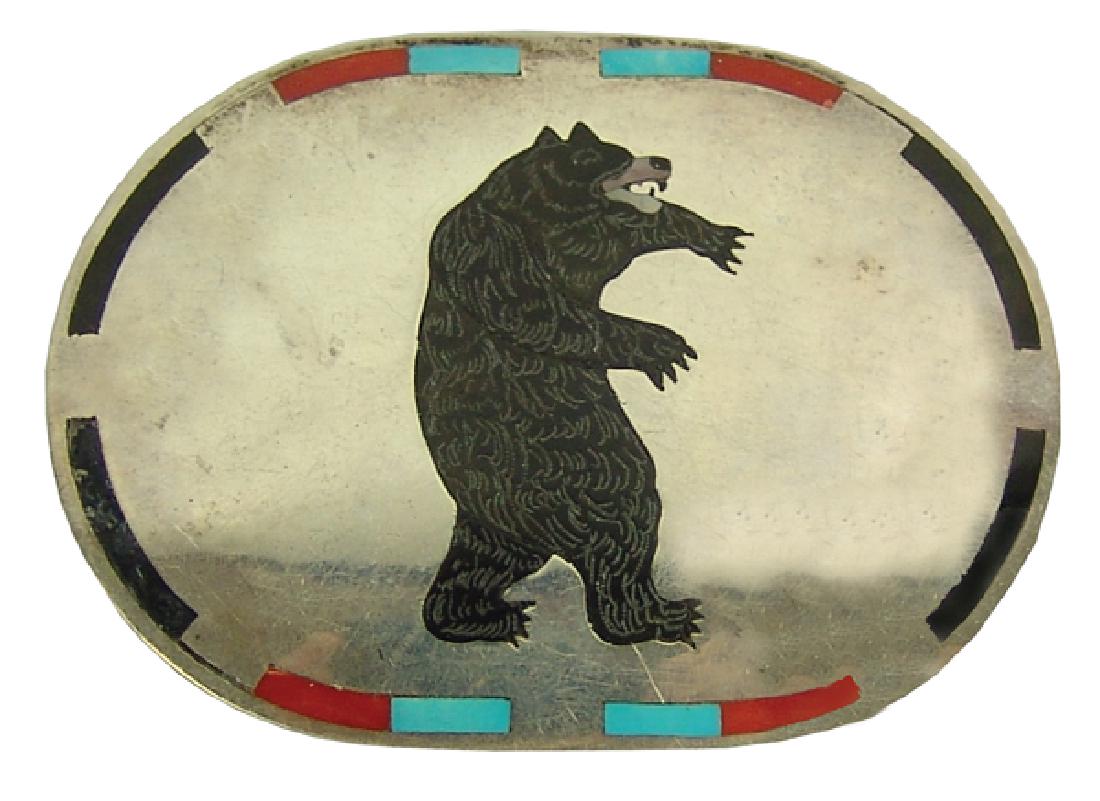 Zuni Inlay Buckle - M&J Edaakie: Vintage all-silver buckle with inlaid turquoise, coral, and jet edging and with an etched bear figure in the center shown in "attack mode." Very good condition.2-1/4" x 3"Ca. 1970s