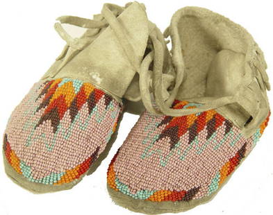 Shoshone Moccasins: Classic, flat beaded, soft soled child's moccasins. 5-1/2"