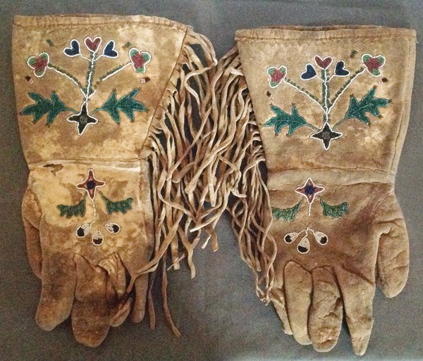 Plateau Beaded Gauntlets: Early, handcrafted gloves with fancy fringed cuffs, both with finely beaded floralistic designs. Good condition, minor bead loss. 13" Early 1900s