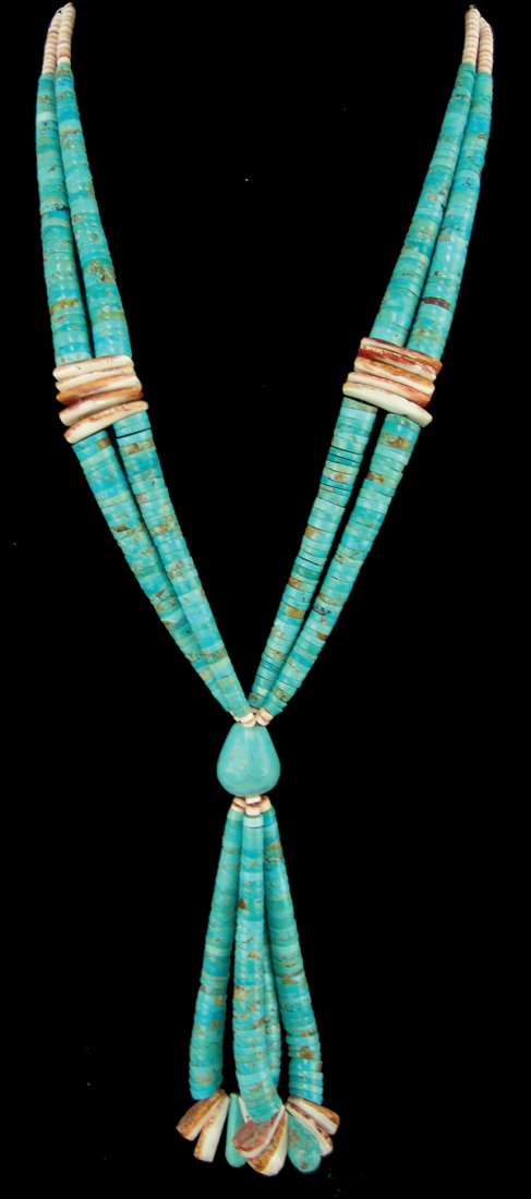 Santa Domingo Necklace: Outstanding, jacla style graduated, turquoise bead necklace with 6" jacla suspensions, and spondulus shell corns and spacers. Very good condition.Late 1900s29"