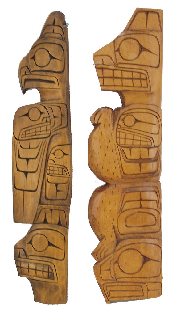 2 NW Coast Carved Panels - Dale Brown: Pair of nice, hand carved, wooden figure panels, both with stylized eagle and bear figures. Good condition, minor scuffs.Ca. 1980s17" x 3-3/4"