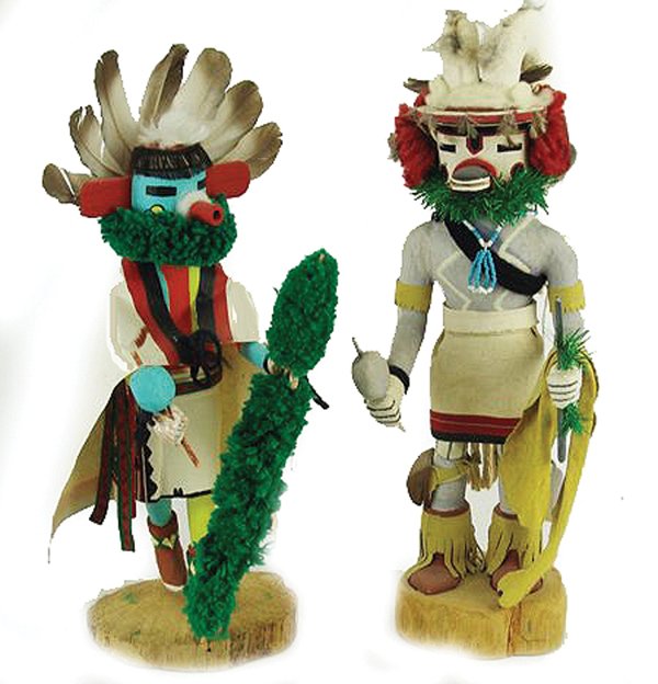 Hopi Kachina Carvings: Pair of hand carved and painted cottonwood root kachina dolls, one a ram kachina. Good condition, some repairs.Ca. 1970s-1980s15" & 15-3/4"