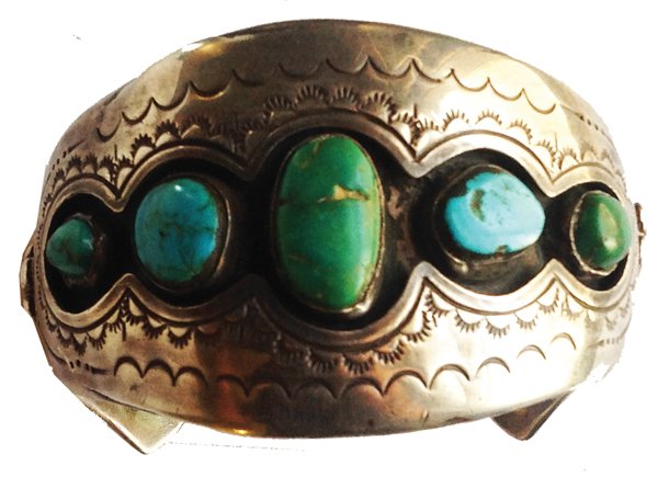 Navajo Bracelet: Classic, shadow box style, all silver bracelet with flared tips, and four, naturally aged, turquoise stones. 6-1/4" + 1-1/4" x 1-3/4" Ca. 1970s