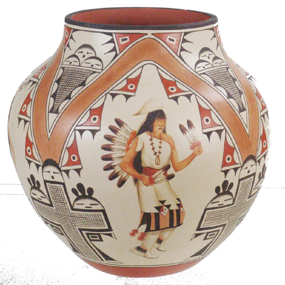 Large Marcellas and Elizabeth Medina Jar: Outstanding, Zia polychrome pottery olla with both traditional design features, plus original paintings of dancers in each of the four sections. Very good condition.Ca.1980s15" x 16"