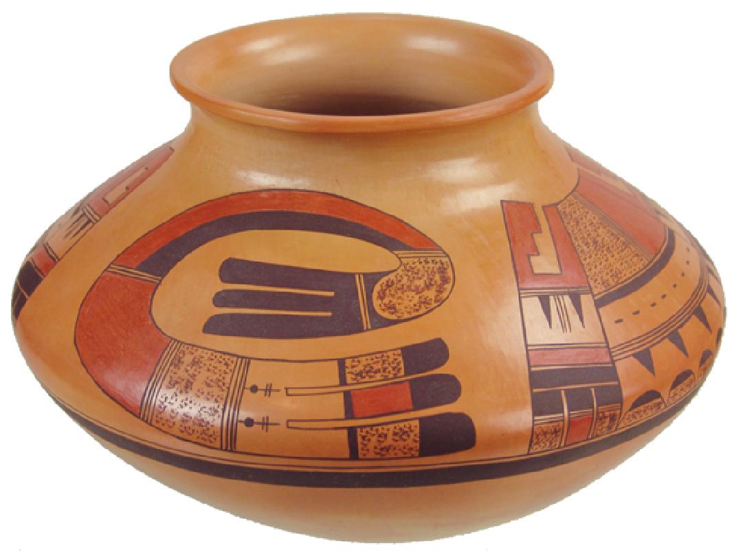 Hopi Pottery Jar: Beautiful, traditional, polychrome-on-yellow pottery olla with large avian forms and other geometrics. Very good condition, signed with corn hallmark and "S".Late 1900s7" x 12"