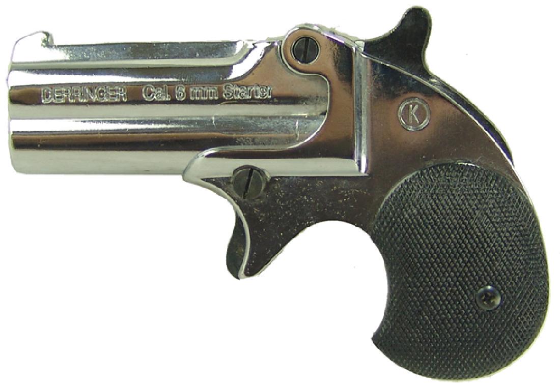 Kimar Blank Firing Derringer: Nickel finish, 6mm blank firing Old West replica double Derringer. Very good condition.Late 1900s5"