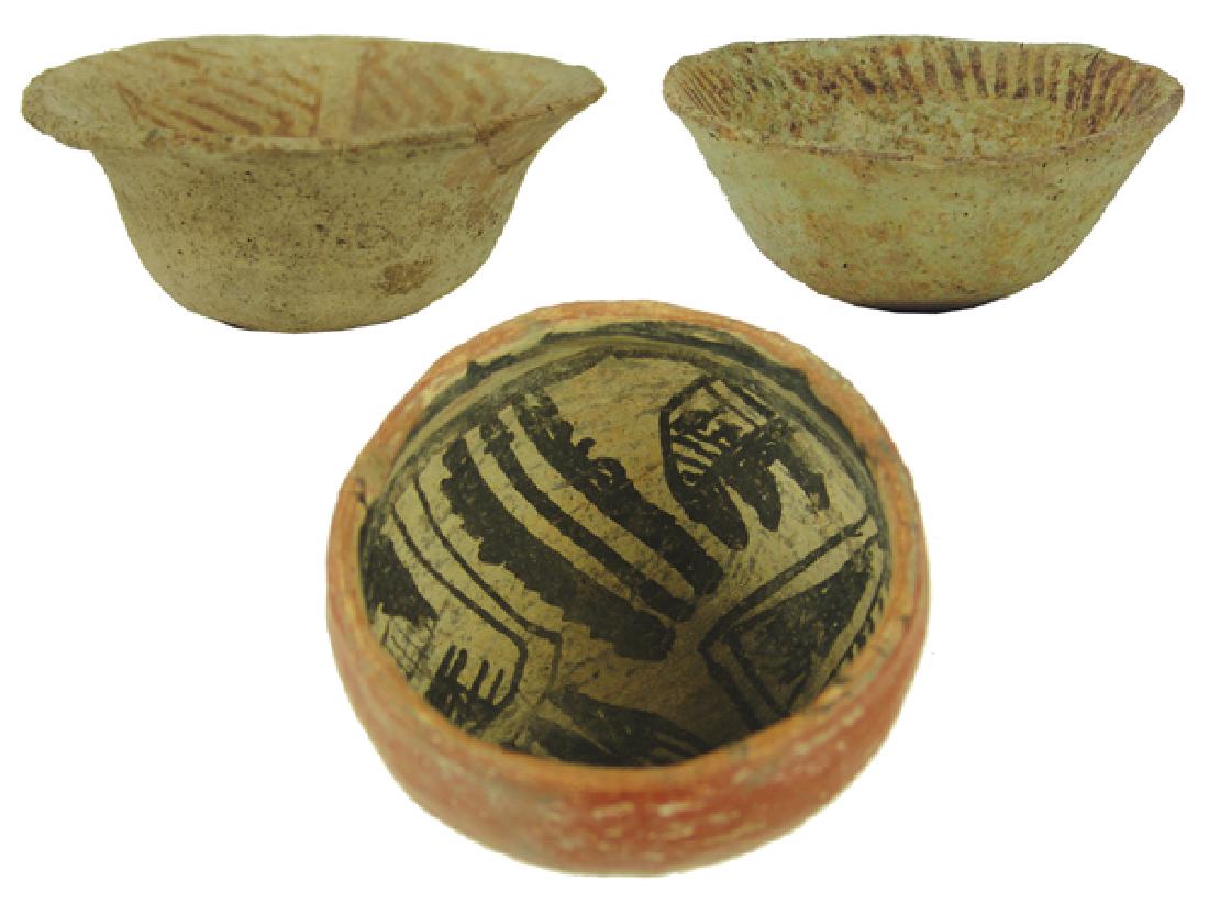 Anasazi/Hohokam Pottery: Group of three small bowls, includes two flared Hohokam, plus a great Gila polychrome. All in good, as found condition.PrehistoricLargest 2" x 4-1/2"