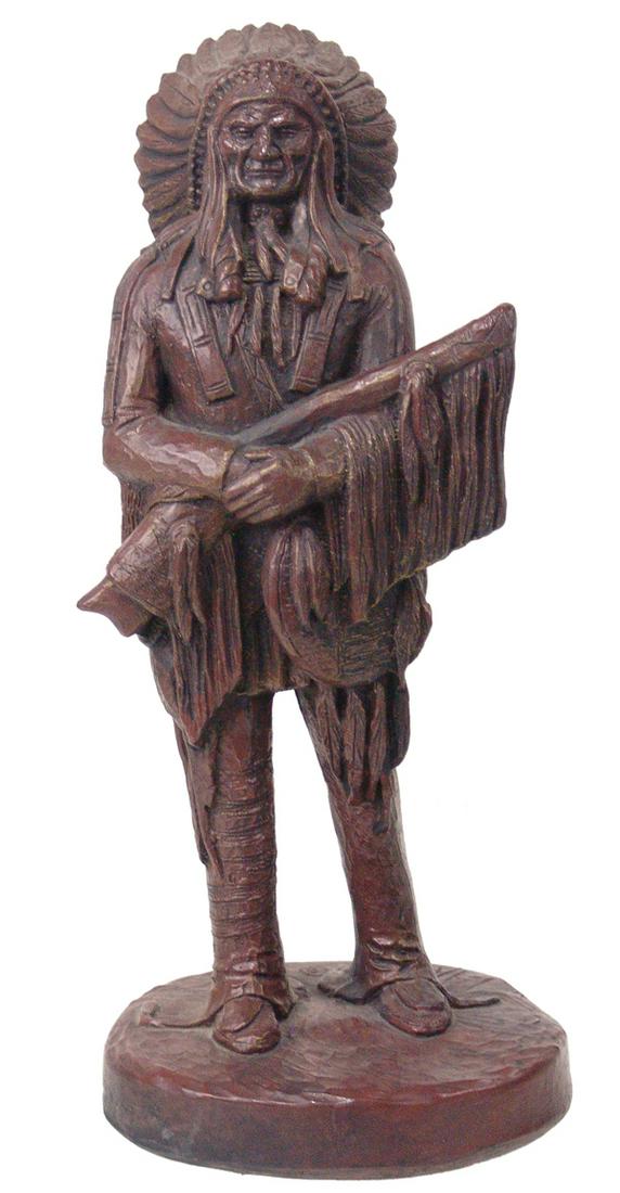 Original Western Sculpture by Largo: Late 1900s 14" Signed, hydrocast bronze resin sculpture showing an Indian Chief wearing his war bonnet and carrying his rifle and scabbard. Very good condition.
