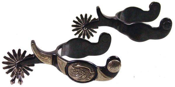 Kelly Blued Steel Spurs: Late 1900s Standard Signed pair of single mounted show spurs with engraved silver overlays, jingle bobs, and 2", 16-point rowels. Excellent condition.