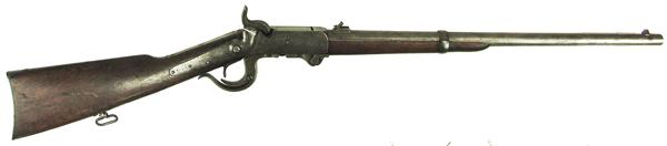 Burnside Saddle Ring Carbine: Ca. 1862 40" Rare, 3rd model, .54 cal. percussion carbine with 21" round barrel, breech loading action, and wooden forestock. Good condition. S/N 17925.