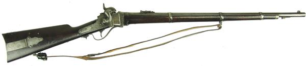 Sharps New Model 1859 Rifle: Ca. 1860 47" Rare, early "New Model 1859" straight breech, lever action rifle in .52 cal. with 32-1/2" blued round barrel, lug for saber, and patch box stock-600, well used condition. S/N 42869.