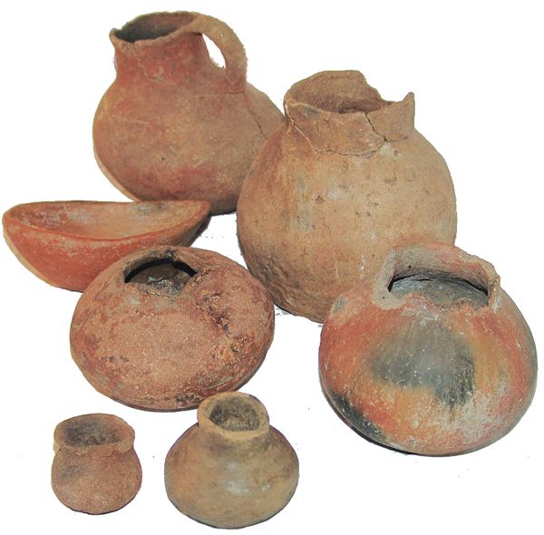 Anasazi Salado Pottery: Prehistoric Pitcher - 6" x 6" x 4" Group of seven, small plain redware pieces including a pitcher, five jars, and a scoop. Fair condition. Some intact, some glued.