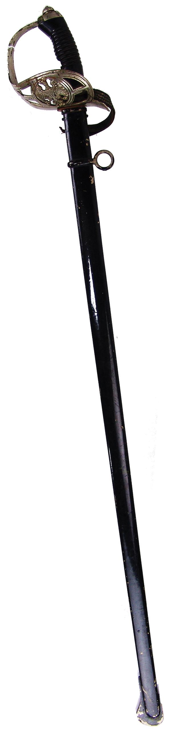 WW1 German Sword: Early 1900s 38-1/2" Model 1889 regimentally engraved cavalry officers sword and sheath from the 17th Braunschweig Husaren regiment. Good/very good condition, with 33" blade.