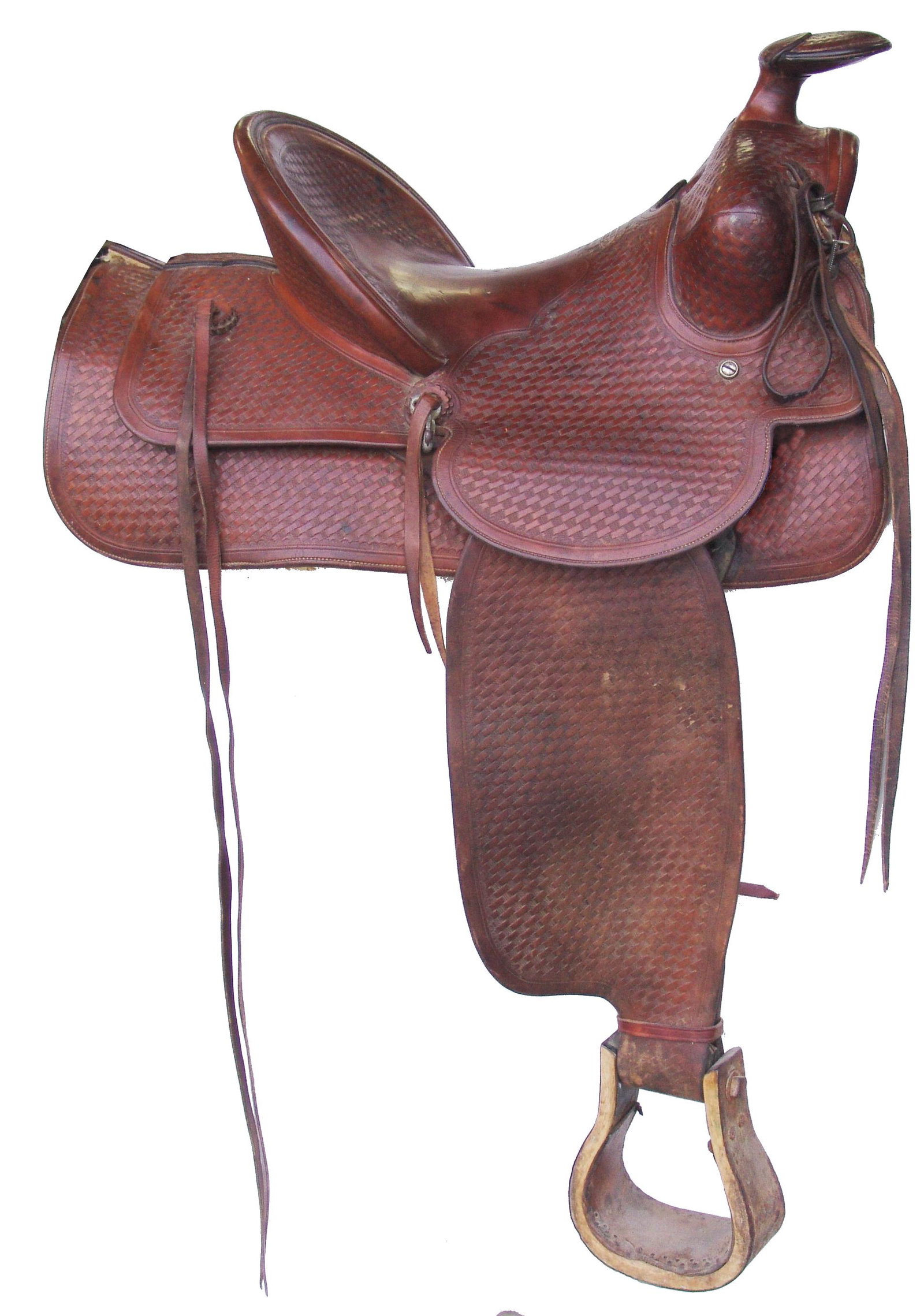 D. E. Walker Western Saddle: Ca. 1970s-1960s Adult Beautiful, high quality saddle with 14" seat, high cantle (monogrammed "OEl"), roping horn, squared skirts, & heavy basket weave tooling. Very good condition.