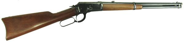 Winchester 94 Saddle Ring Carbine: Mid 1900s 38" Famous, model 1892 lever action .38 cal. saddle ring carbine with reblued hardware and 20" round barrel. Very good condition. S/N 674059