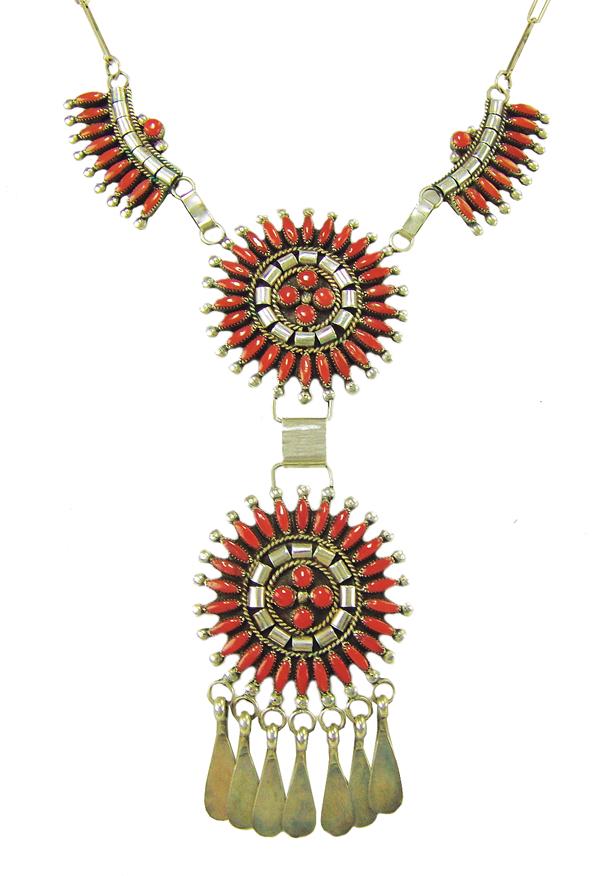 Zuni Coral Necklace: Ca. 1970s 17" + 5" pendant Very fine, silver and needle point coral necklace with double rosette pendant and matching side segments. On hand made silver chain. Very good condition,