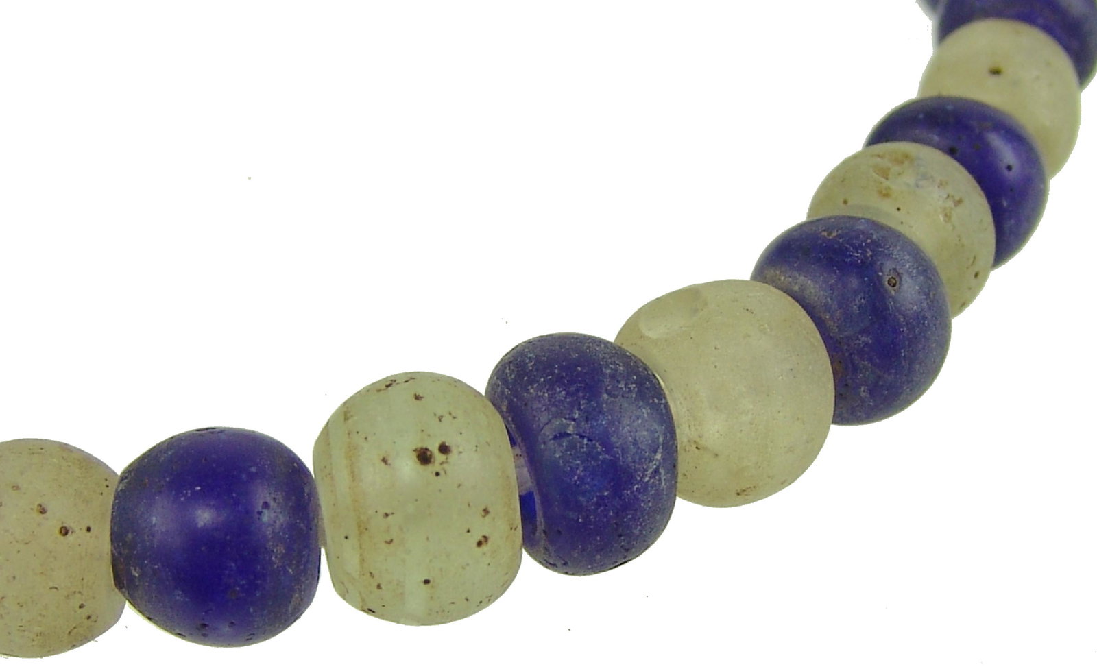Antique Tradebeads: Early/Mid 1900s Rare, extra-long strand of Dogon, blue and white, Dutch glass tradebeads from Nigeria, with string wrap top. Very good condition with natural flaws/cracks.