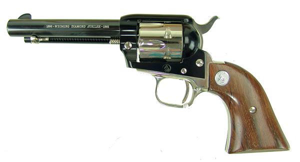 Colt Commemorative Frontier Scout: Ca.1964 10-1/2" Limited edition, .22 cal. revolver with 4-3/4" barrel specially marked "1890 - Wyoming Diamond Jubilee - 1965." Excellent condition, in original Colt presentation box. S/N 910DJ