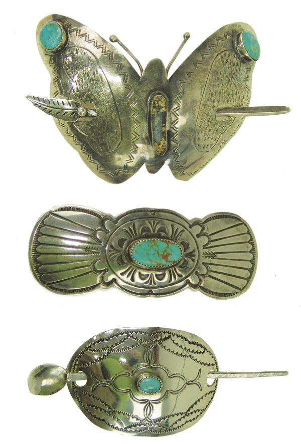 3 Navajo Hair Holders - David Garcia: Ca. 1980s Largest 4" x 3" Fine collection of all silver pieces, each with turquoise stones and stamped designs, the large butterfly (missing one stone) signed by David Garcia. Very good condition.