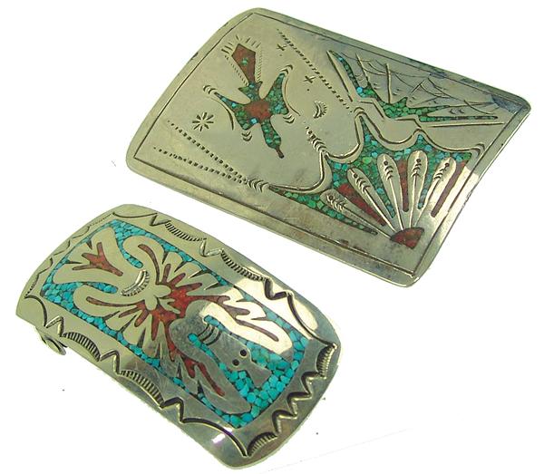 2 Navajo Chip Inlay Buckles: Ca. 1970s - 1980s Largest 3" x 2" Two fine examples of this style of work, the smaller a large eagle design by Gibson Gene, the larger signed "mt" or "tm", both in good, used and wearable condition.
