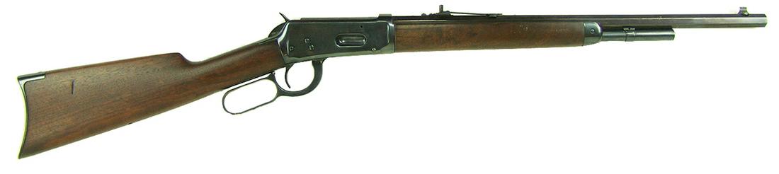 Winchester Model 1894 Rifle: Fine, 25-35 WCF caliber rifle with special order, 20" octagon barrel, short magazine, and fancy grade wood. Very good condition. S/N 796487. Ca. post 1925. 38" *Purchase of this firearm requires FFL p