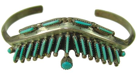 Navajo Turquoise & Silver Bracelet - Anna Begay: Delicate, Zuni style needle point bracelet done in chevron form on a single, 3-sided silver band. Very good condition. Late 1900s. 5" + 1-1/8" gap x 3/4" wide.