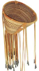 Apache Burden Basket: Beautiful, twined weave, conical shaped basket with the design reversed on the interior, and the exterior trimmed with the traditional, reinforcing leather bands, and with long fringe having tin cone 