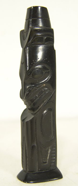 Haida Argillite Totem Pole: A smaller version of the above, carved from argillite depicting a single mythical creature. Condition: very good. Circa mid 1900s. 4 1/4" high