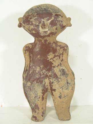 Colima Pottery Figure: Small redware figure in flattened human form with protruding features. Condition: very good, original. Circa prehistoric. 8"