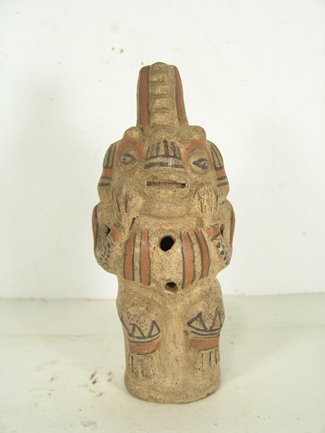Colima Pottery Figure: Seated polychrome pottery figure collected in Mexico in the 1950s. Condition: very good condition. Circa mid 1900s. 8" x 3 1/2" x 2 1/2"