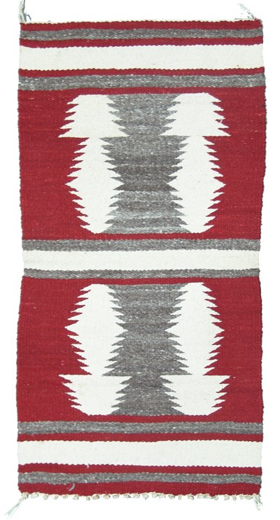 Navajo Rug/Weaving: Traditional hand woven shelf rug/runner with interesting mirror image design. Condition: Very good. Circa mid 1900s. 17" x 34-1/2"