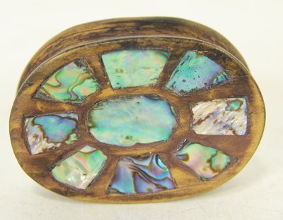 Northwest Coast Wooden Labret: Rare well carved wooden lip or ear adornment with abalone inlay on both sides. Condition: Excellent. Circa 1970s. 1/2" high x 1-7/8" long x 1-1/4" wide