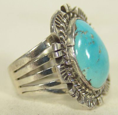 Navajo Turquoise & Silver Ring: Classic design single stone turquoise and silver ring. Condition: Excellent. Circa late 1900s. 8-3/4