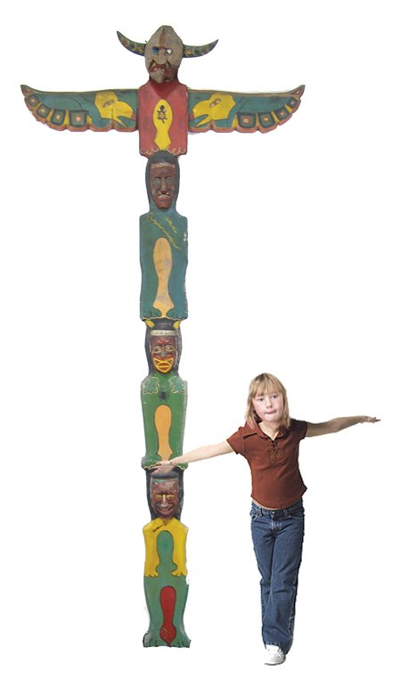 Vintage Folk Art Totem Pole: Unique hand carved and painted NW Coast-style totemic pole with thunderbird wings, three carved mask faces, and an ugly horned ogre-type hat at top made from a coconut (girl not included). 8'1" Circa