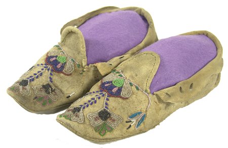 Chippewa Beaded Moccasins: Traditional pair of moose hide moccasins with hard soles and beaded floral motif; good condition, few missing beads. 10-1/2" Circa 1920s