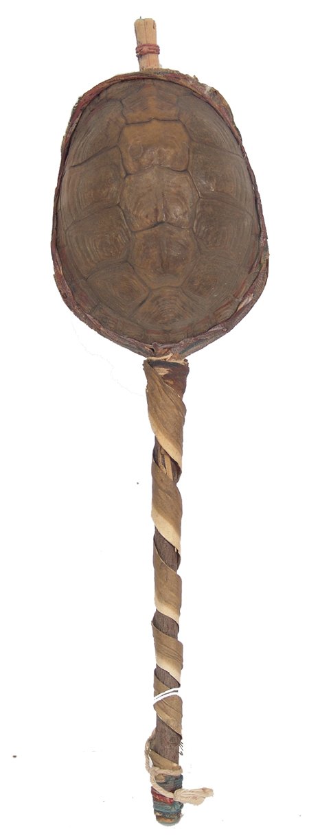 Iroquois Dance Rattle: Rare old turtle shell dance rattle with painted rawhide trim and binding and wrapped handle; good condition. 15" Early 1900s