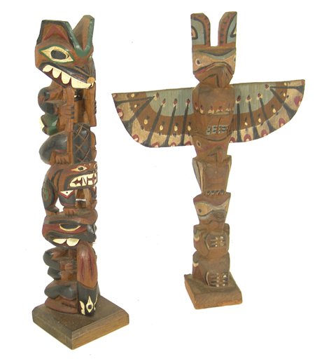 Two NW Coast Totem Poles: Frank Williams, Pair of classic vintage cedar poles, the winged version unsigned, the other signed Frank Williams; very good condition. 12-1/2" x 2-3/4", 12" x 8" Circa Early/Mid 1900s