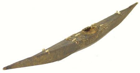 Greenland Eskimo Toy Kayak: Very rare hand crafted wood and stretched sealskin boat; good condition. 14" x 1-1/2" Circa 1900